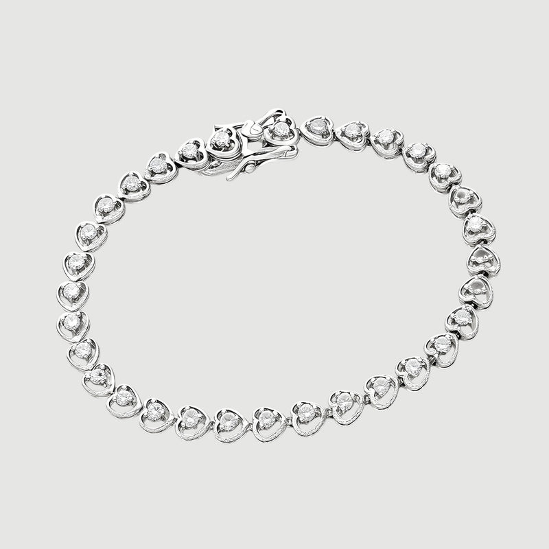 Amara Jewels 925 sterling silver bracelet with delicate heart-shaped links and cubic zirconia accents, secured with a lobster clasp.