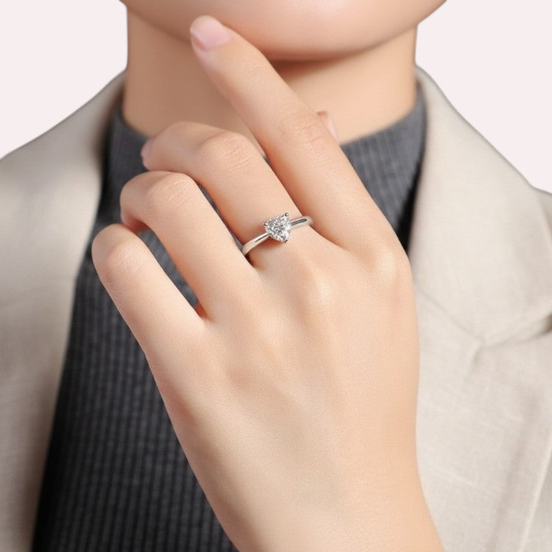 Amara Jewels sterling silver ring with a heart-shaped clear zircon solitaire.