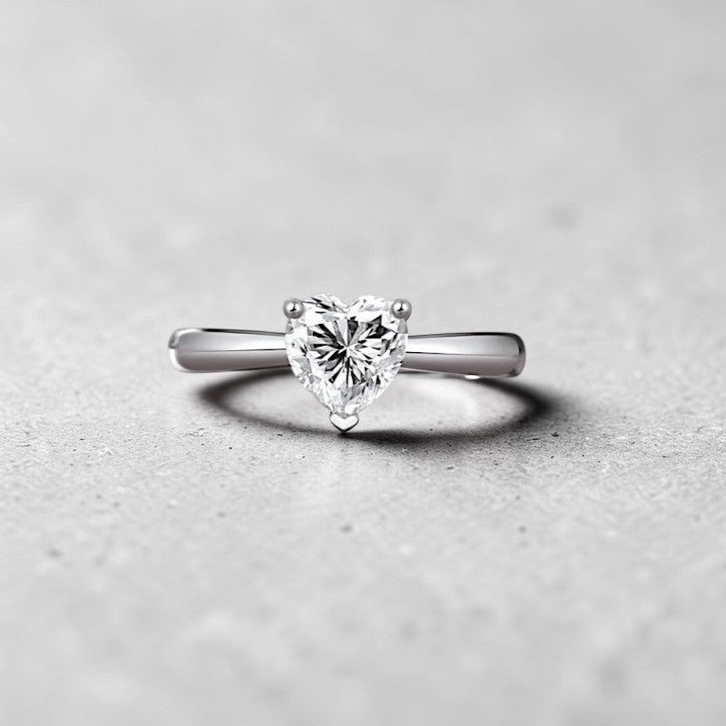Amara Jewels sterling silver ring with a heart-shaped clear zircon solitaire.