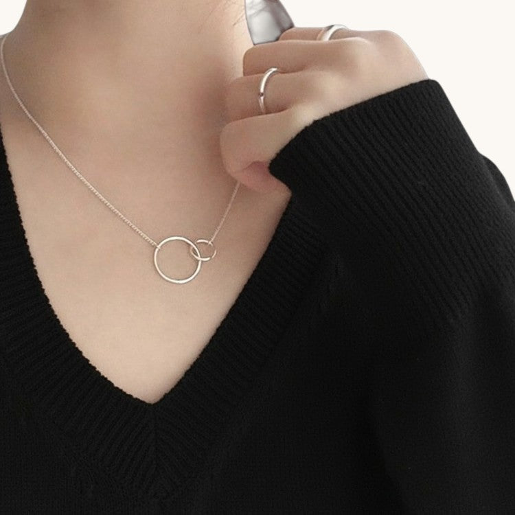 Amara Jewels elegant interlocking circles necklace in polished sterling silver.