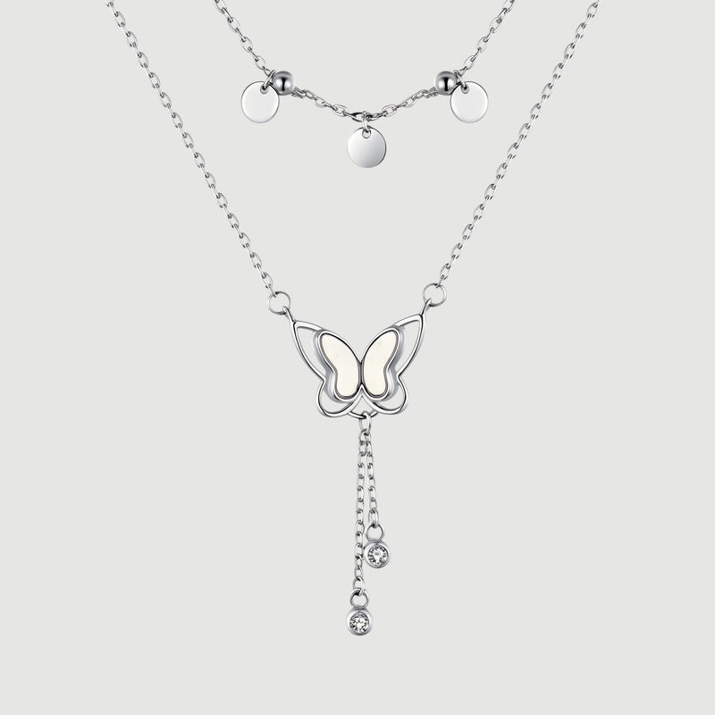 Amara Jewels double-layered sterling silver necklace with butterfly pendant and dangling crystals.