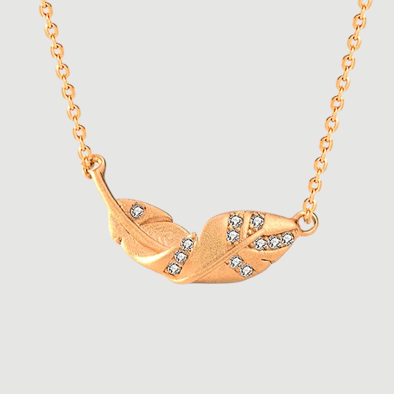 Amara Jewels gold-plated 925 sterling silver necklace with a leaf pendant adorned with cubic zirconia.