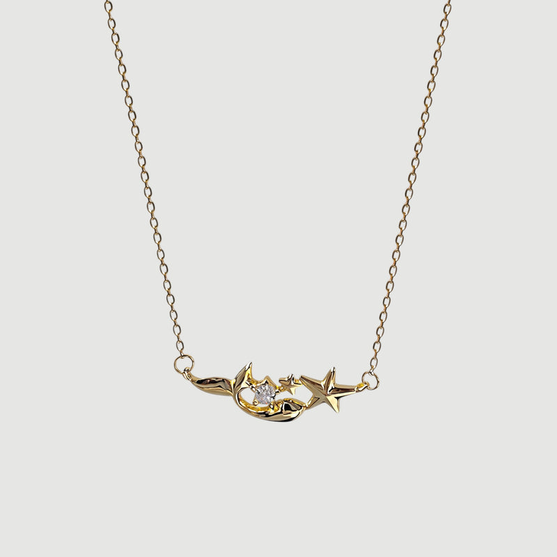 Amara Jewels gold plated sterling silver mermaid and star necklace with crystal accent.