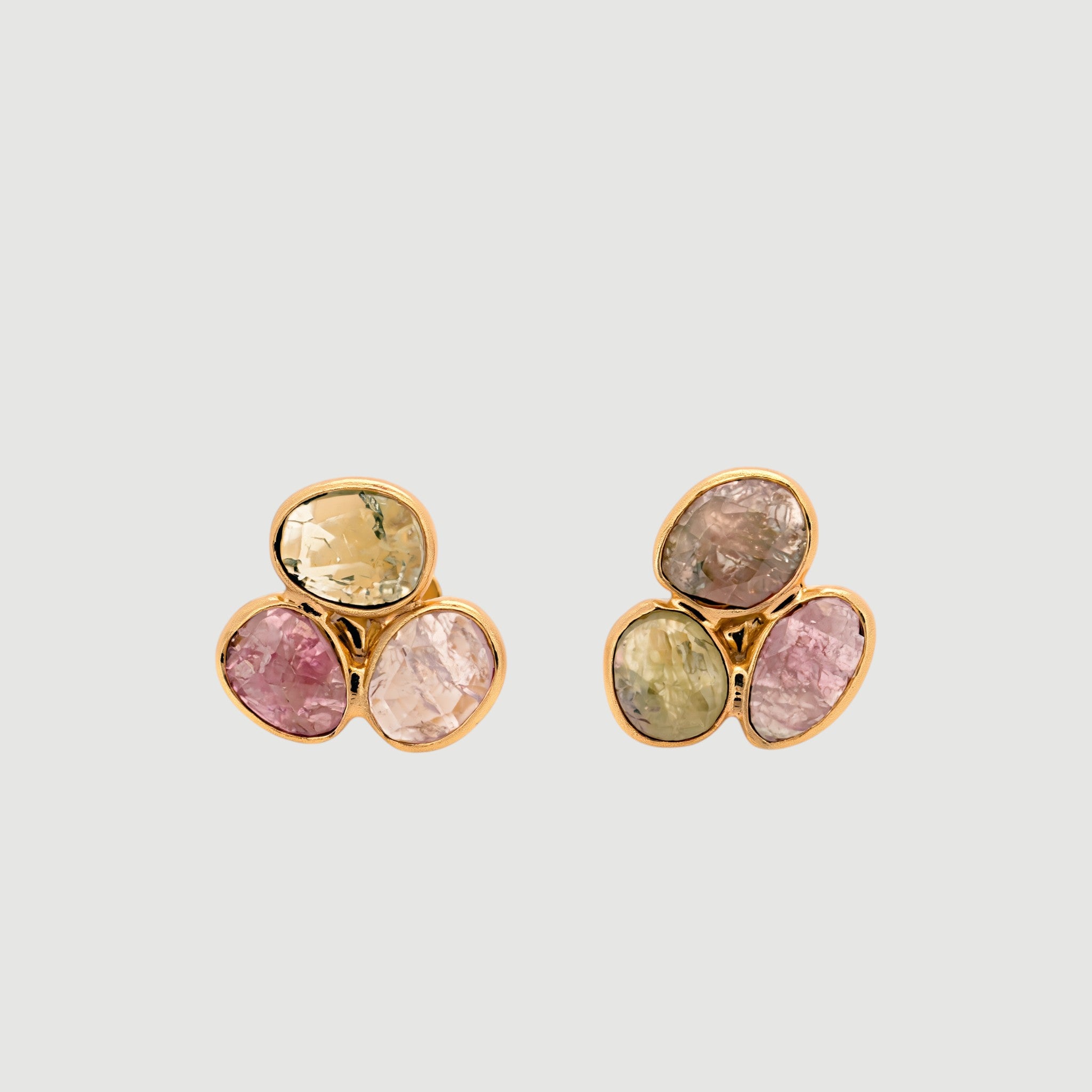 Amara Jewels natural multi-color tourmaline stud earrings in 18K gold vermeil over sterling silver. Features pink, green, and brown hues.