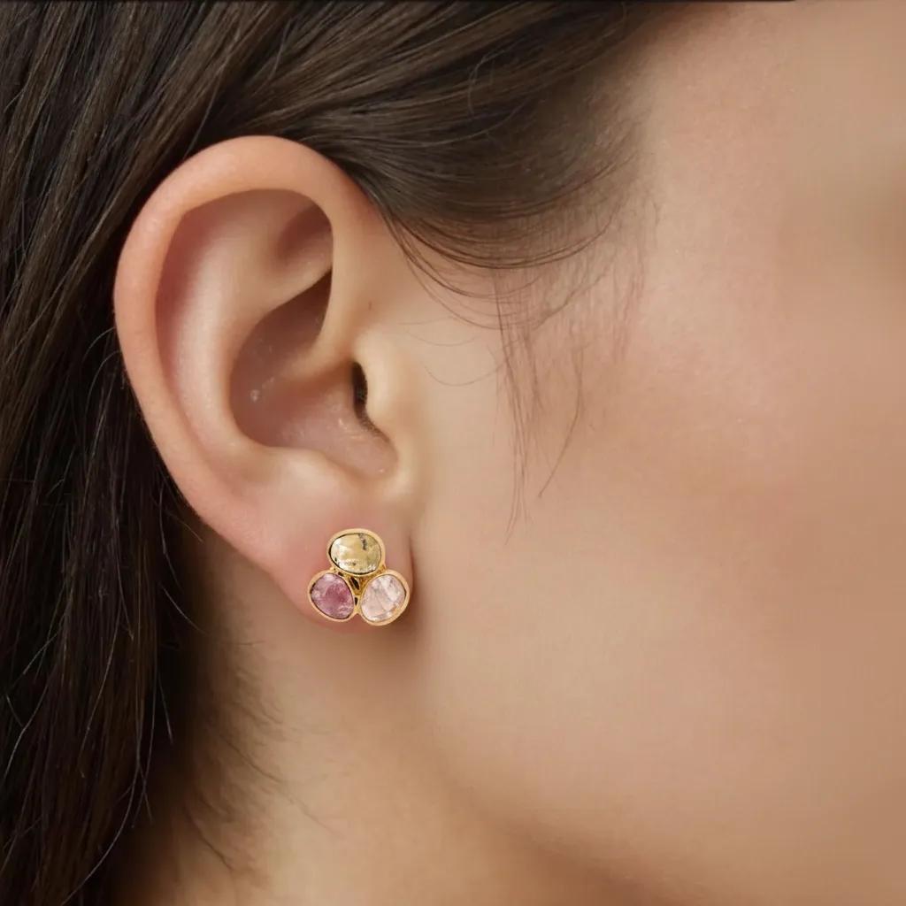 Amara Jewels natural multi-color tourmaline stud earrings in 18K gold vermeil over sterling silver. Features pink, green, and brown hues.