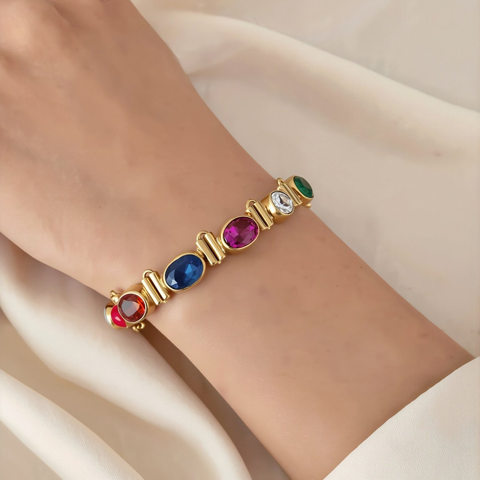 Amara Jewels multi-gemstone bracelet with ruby, sapphire, citrine, peridot, and garnet on 18K gold vermeil over sterling silver.