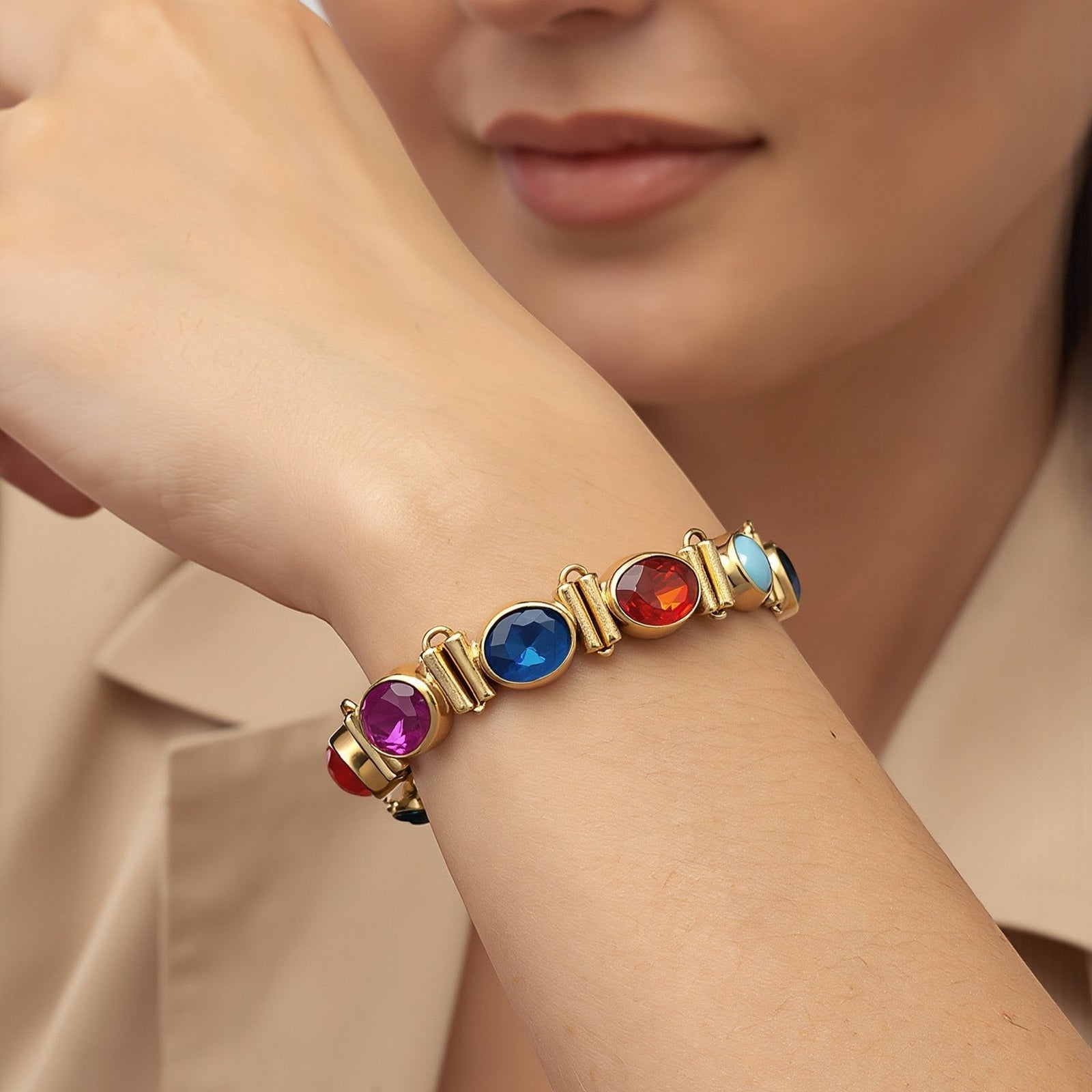 Amara Jewels multi-gemstone bracelet with oval ruby, sapphire, citrine, peridot, and garnet stones in 18K gold vermeil.