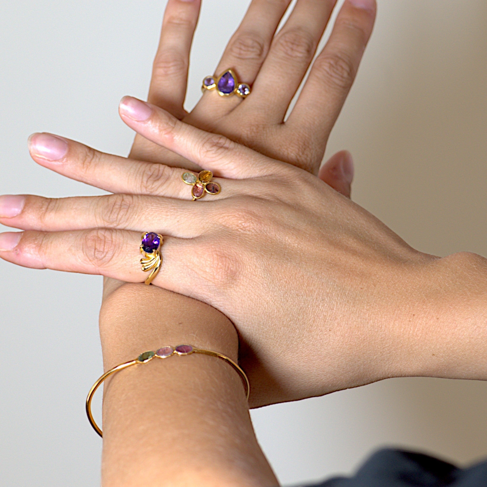 Amara Jewels 18K gold plated sterling silver ring with amethyst and two purple tourmalines.