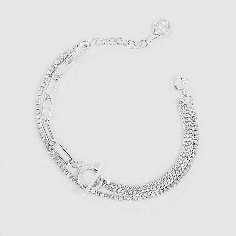 Amara Jewels layered chain sterling silver bracelet with toggle clasp featuring circle T charm.