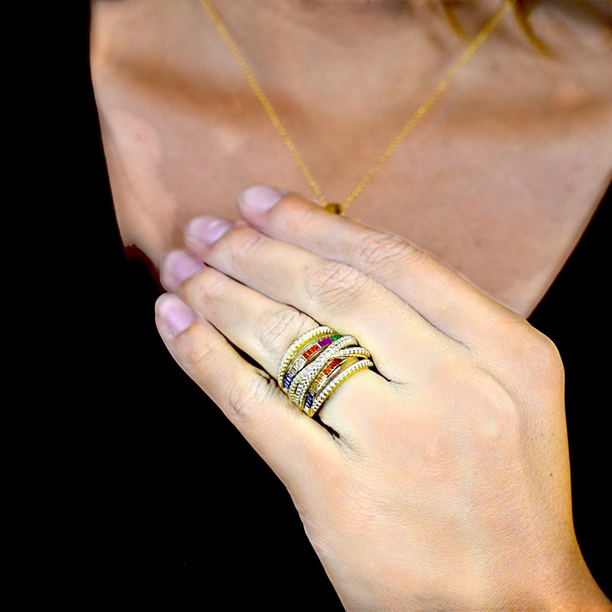 Amara Jewels gold-plated 925 sterling silver ring with multicolor cubic zirconia stones and pave details. Layered design.