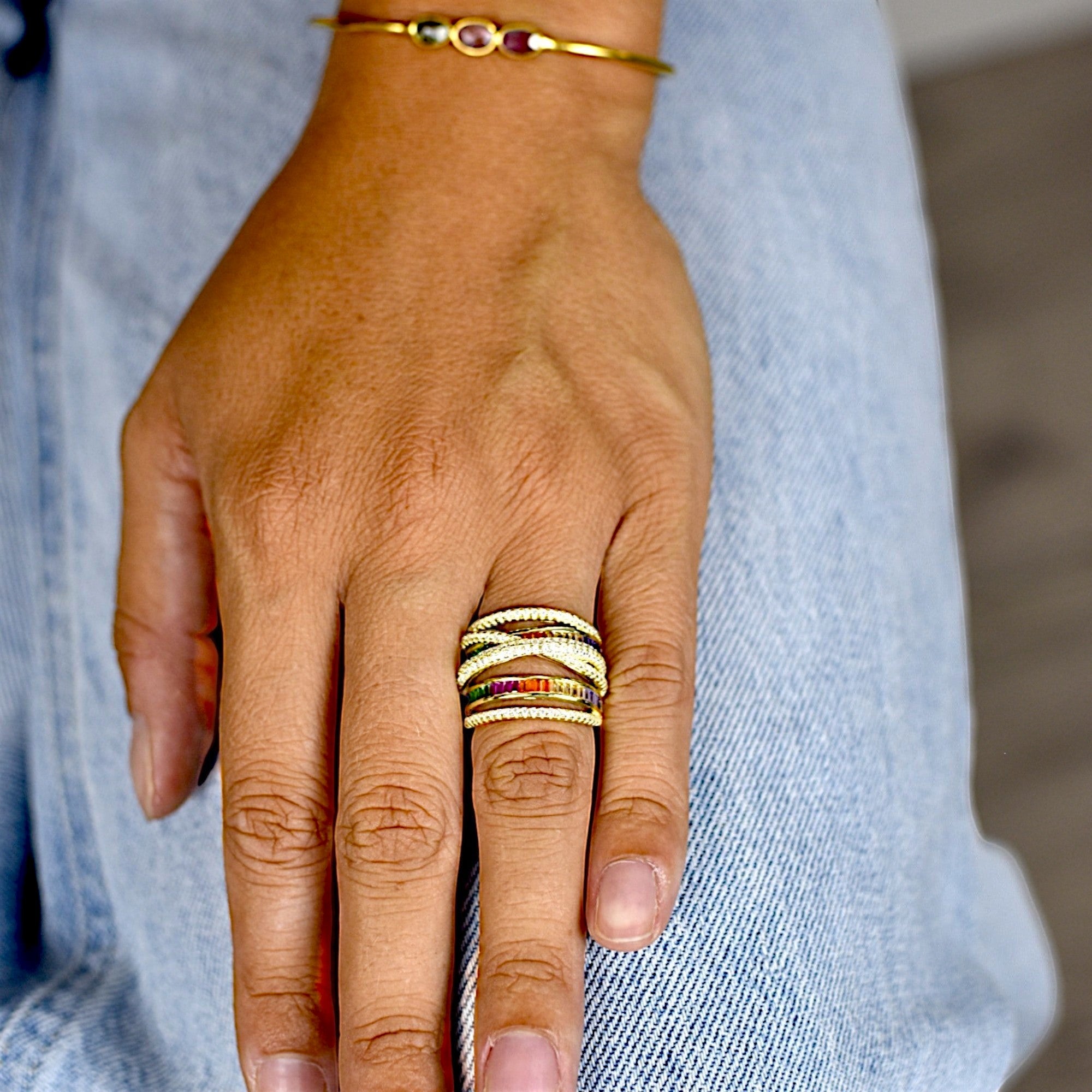 Amara Jewels gold-plated 925 sterling silver ring with multicolor cubic zirconia stones and pave details. Layered design.