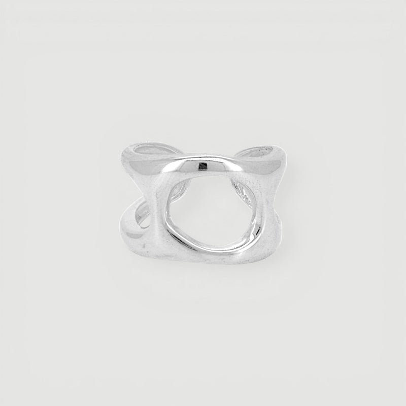 Amara Jewels statement open ring in polished sterling silver with a gold finish. Modern, abstract design.