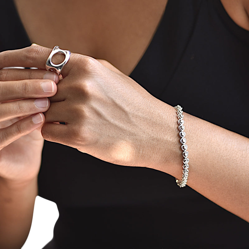 Amara Jewels statement open ring in polished sterling silver with a gold finish. Modern, abstract design.