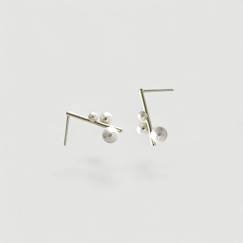 Amara Jewels modern geometric sterling silver earrings with three pearls each.