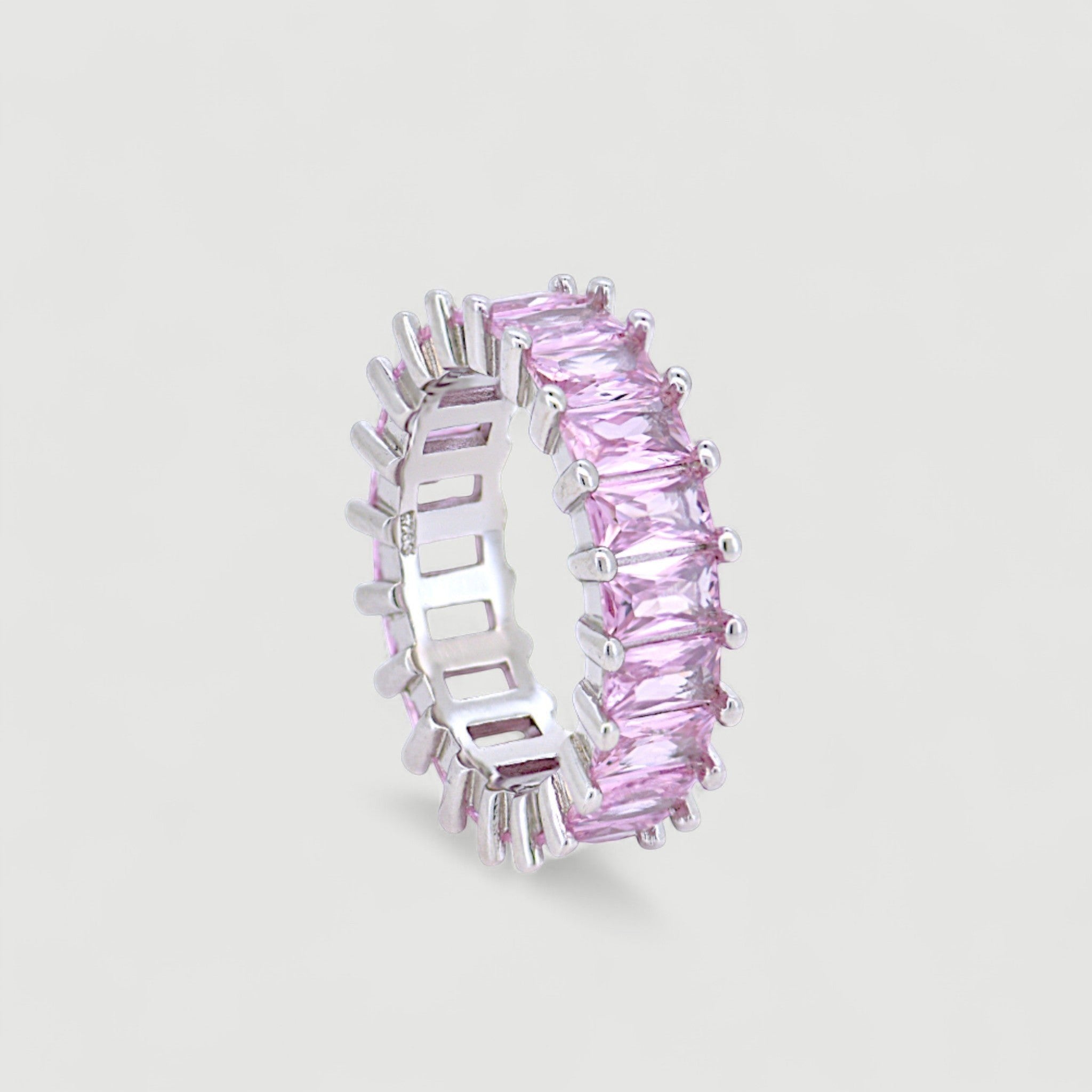 Amara Jewels pink baguette eternity ring in sterling silver with a polished finish.