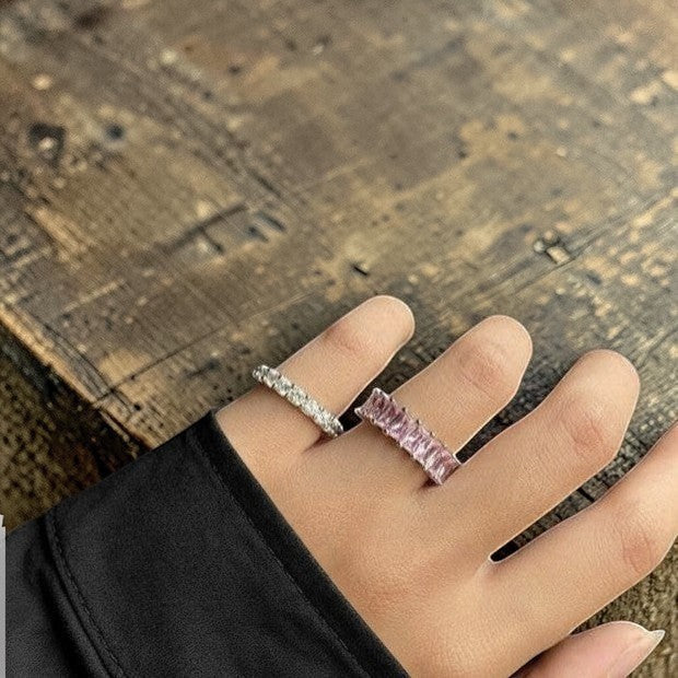 Amara Jewels pink baguette eternity ring in sterling silver with a polished finish.