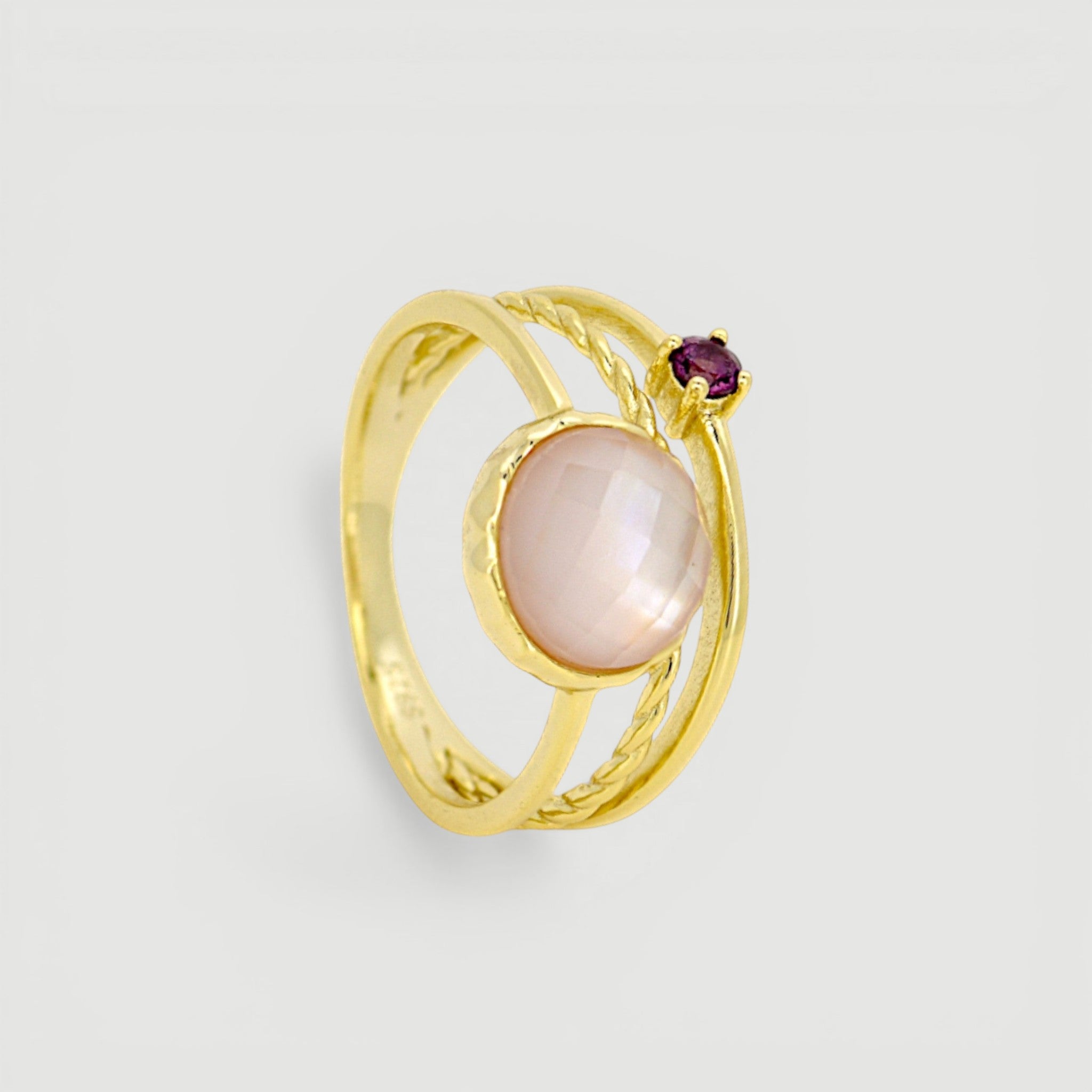 Amara Jewels gold-plated sterling silver ring with a pink shell pearl and a small ruby accent.