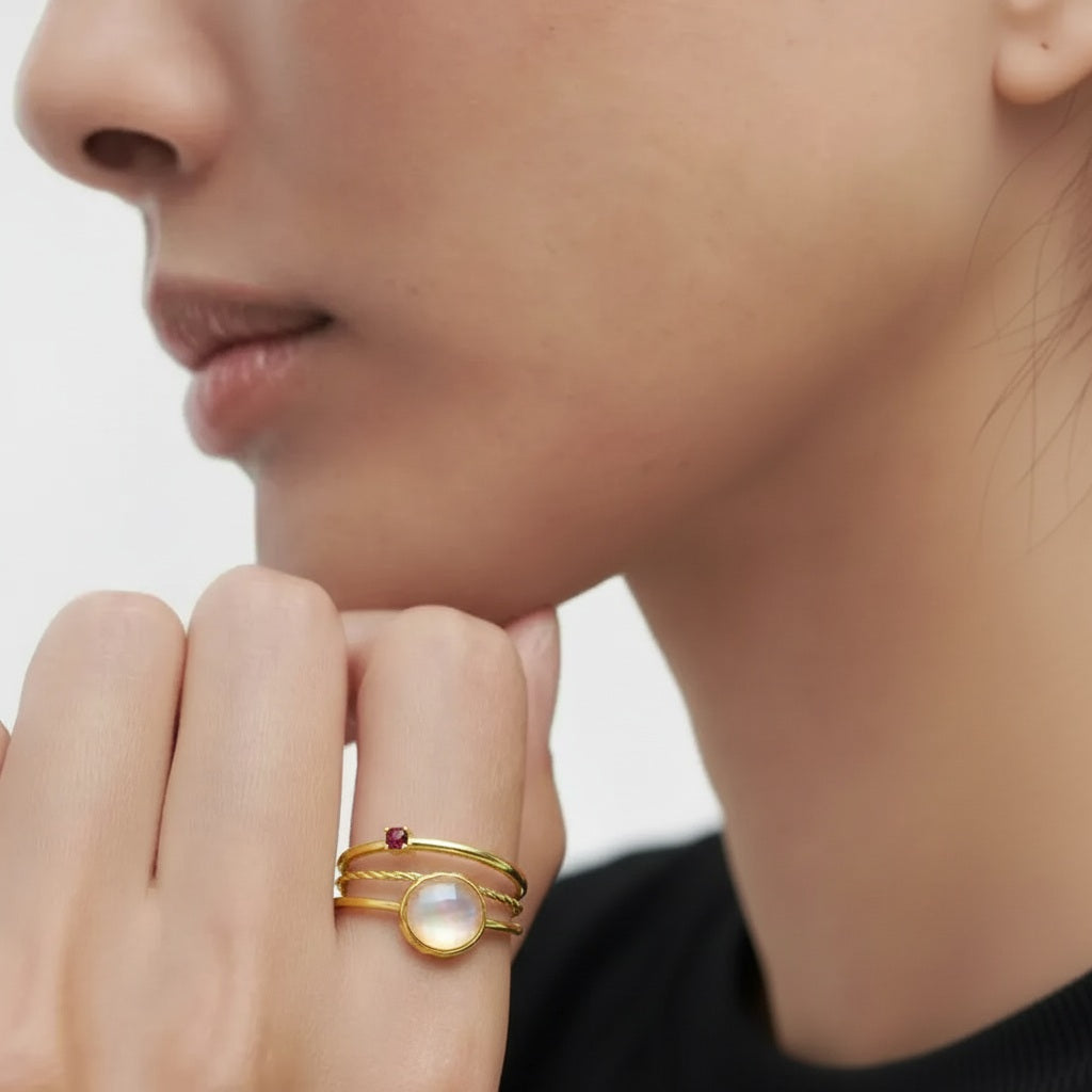 Amara Jewels gold-plated sterling silver ring with a pink shell pearl and a small ruby accent.