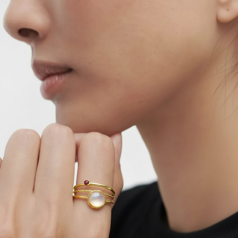 Amara Jewels gold-plated sterling silver ring with a pink shell pearl and a small ruby accent.