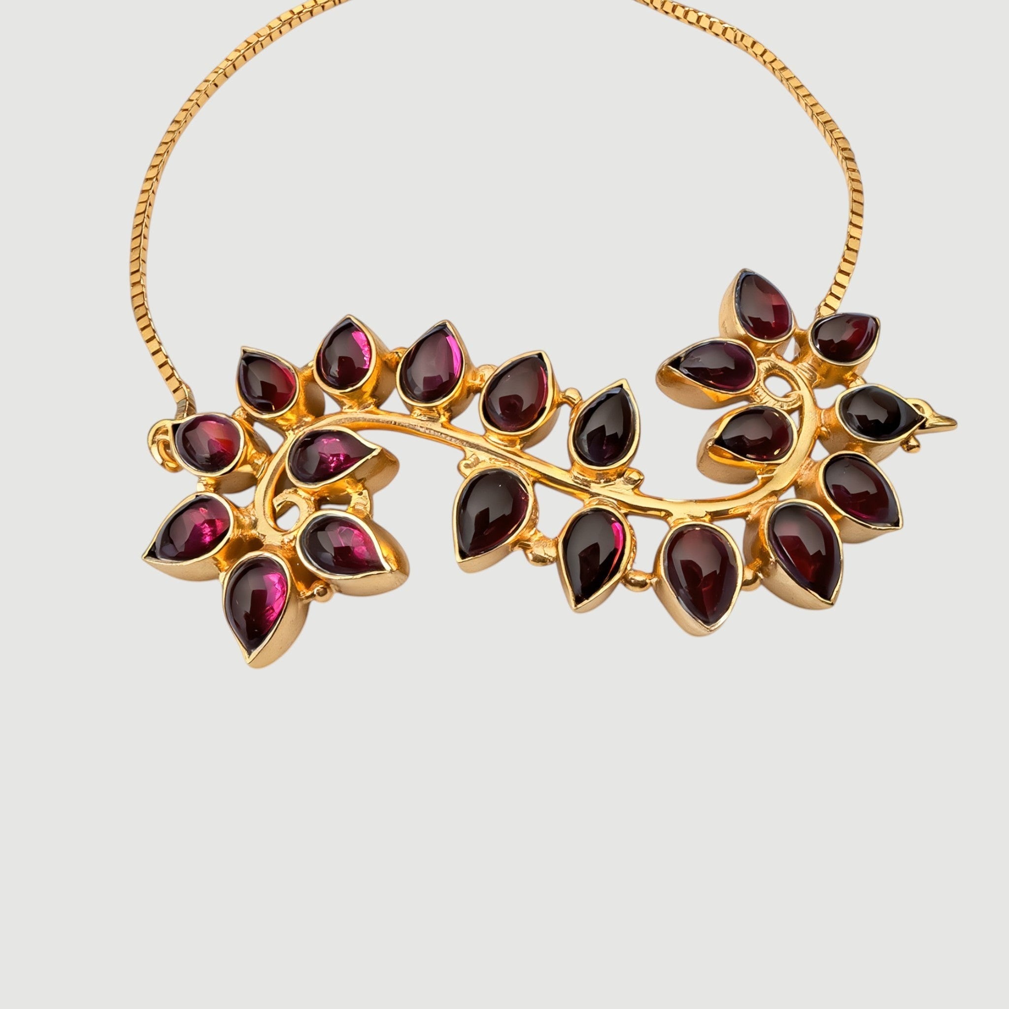 Amara Jewels Radiant Bloom Garnet Bracelet: 925 sterling silver gold vermeil with pear-cut garnet stones in a floral vine design.