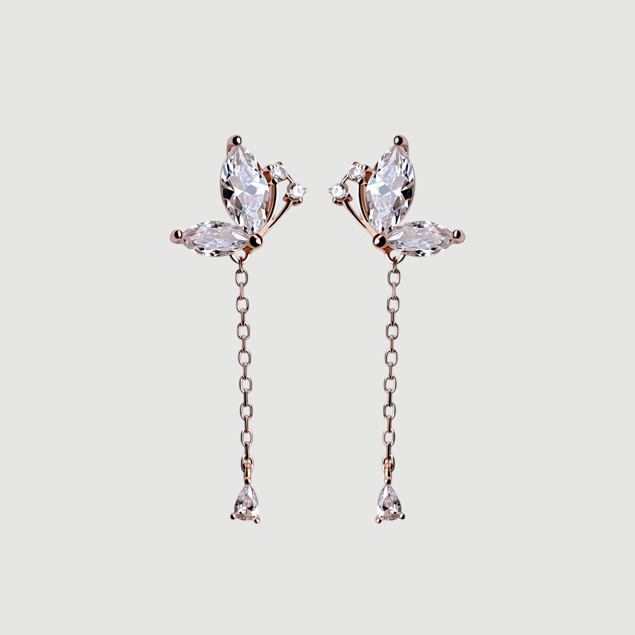 Amara Jewels rose gold plated sterling silver butterfly drop earrings with marquise and teardrop cubic zirconia stones.