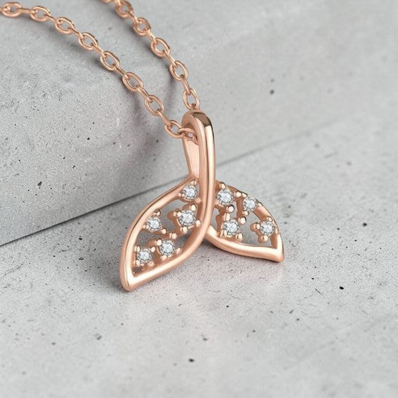 Amara Jewels rose gold plated sterling silver fishtail necklace with cubic zirconia stones.