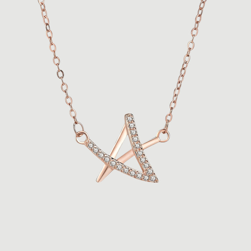 Amara Jewels rose gold geometric pendant necklace with crystals on a delicate chain.