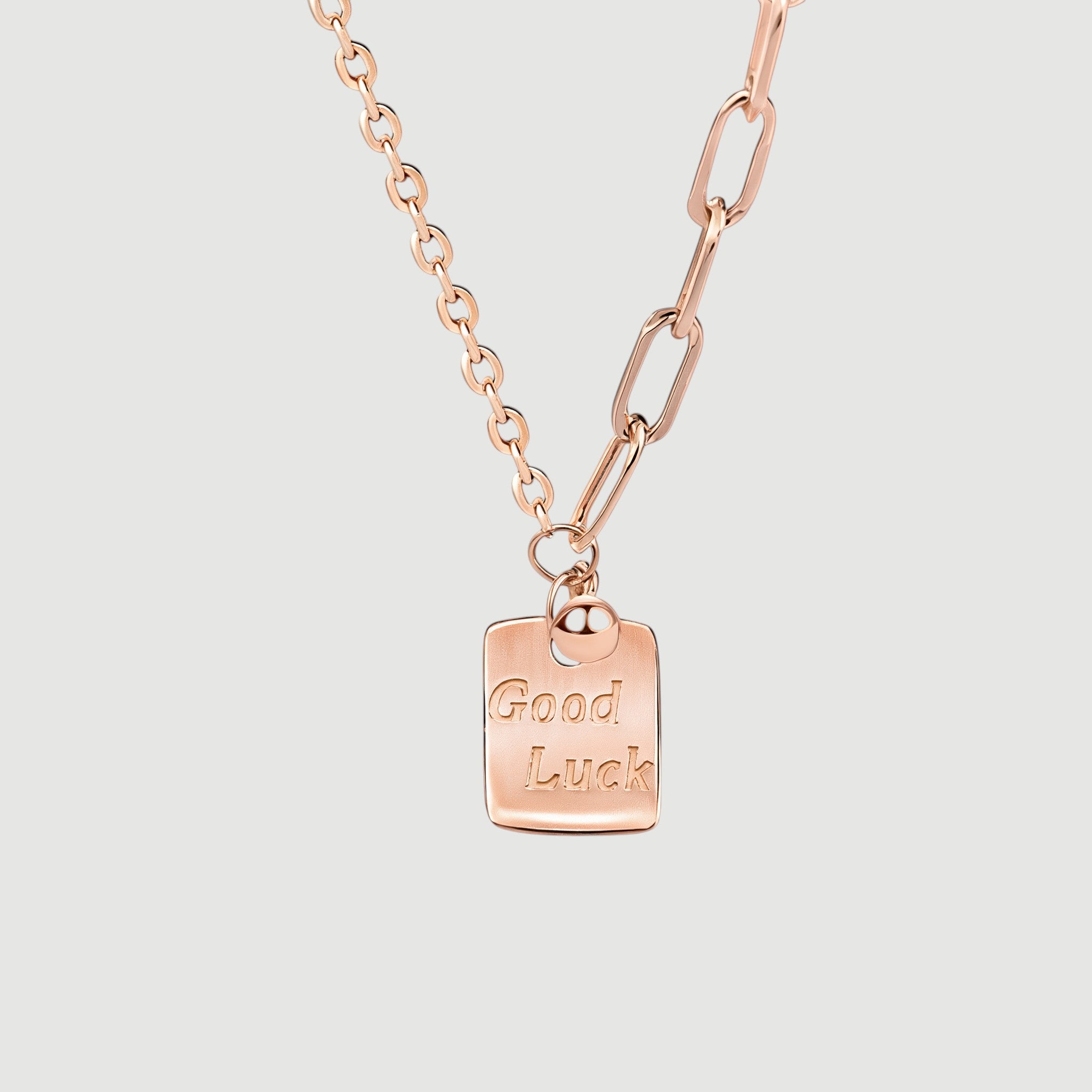 Amara Jewels rose gold plated sterling silver necklace with a square pendant engraved with "Good Luck".