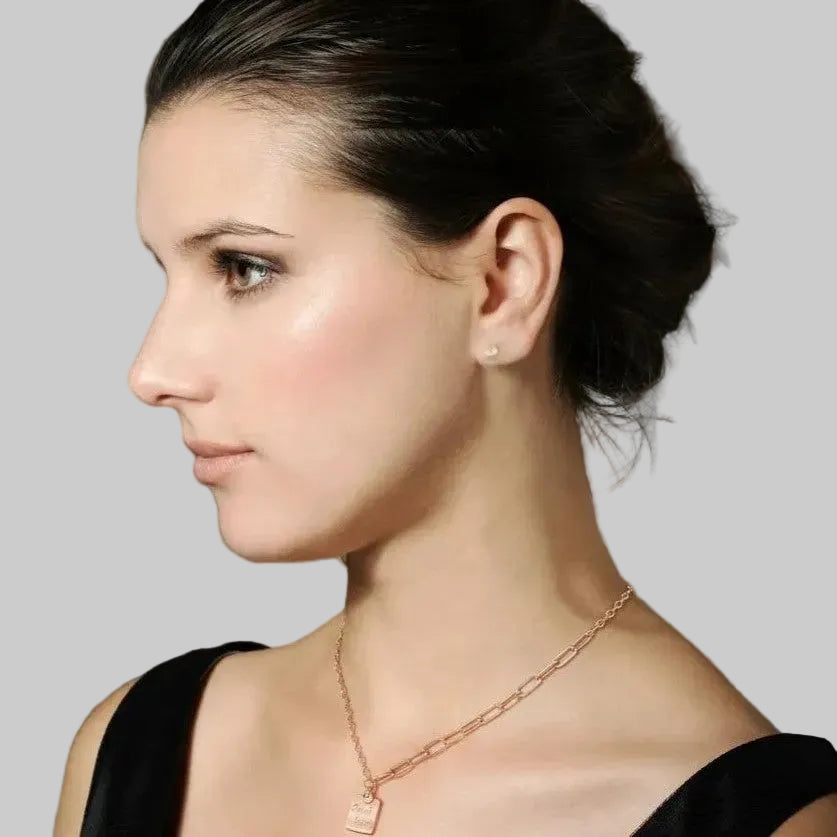 Amara Jewels rose gold plated sterling silver necklace with a square pendant engraved with "Good Luck".