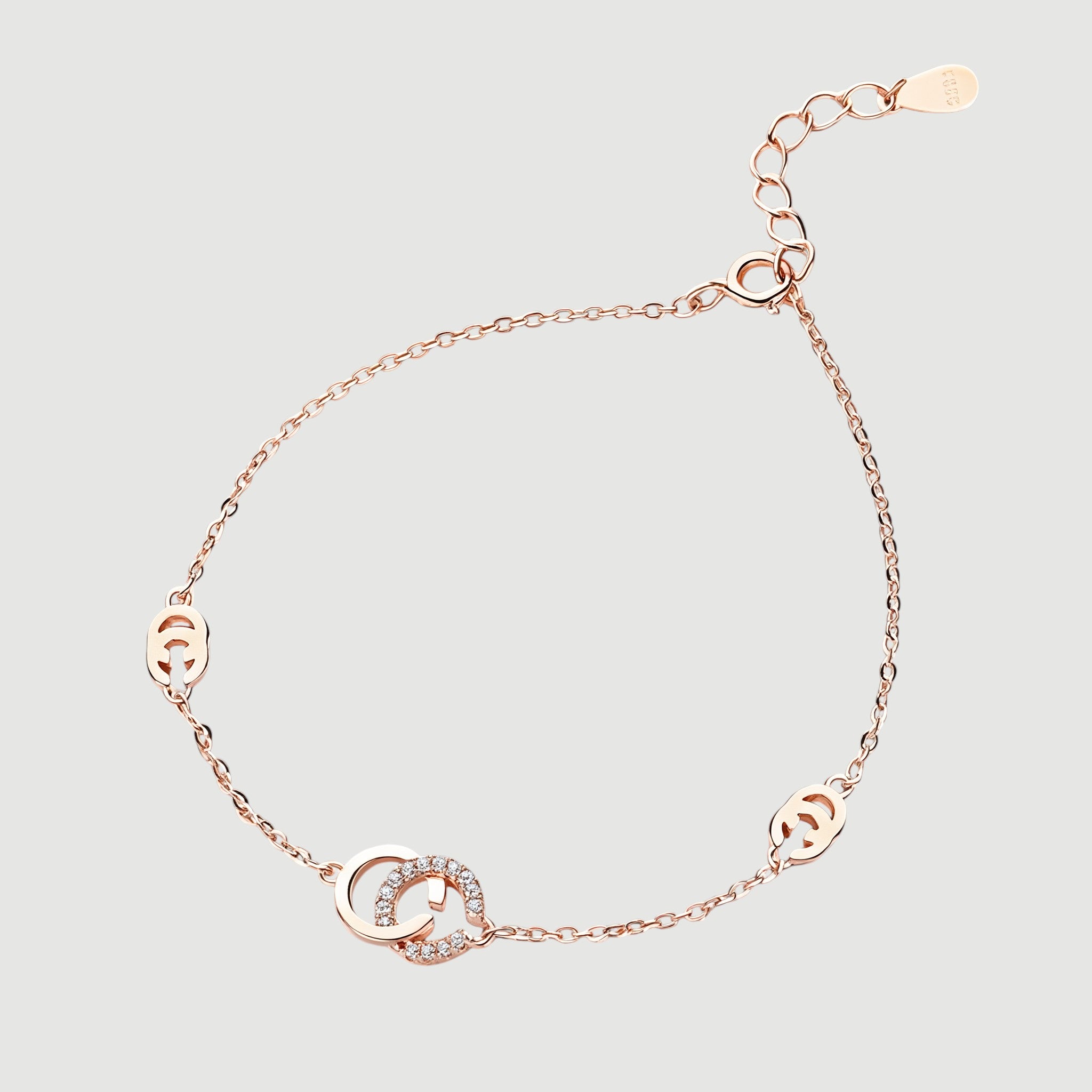 Amara Jewels rose gold 925 sterling silver adjustable chain bracelet with interlocking circles, one adorned with cubic zirconia.