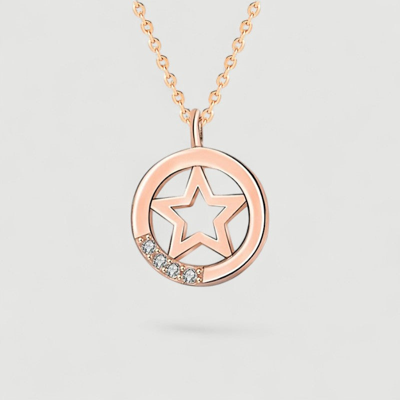 Amara Jewels rose gold plated sterling silver necklace with a star pendant and cubic zirconia accents.