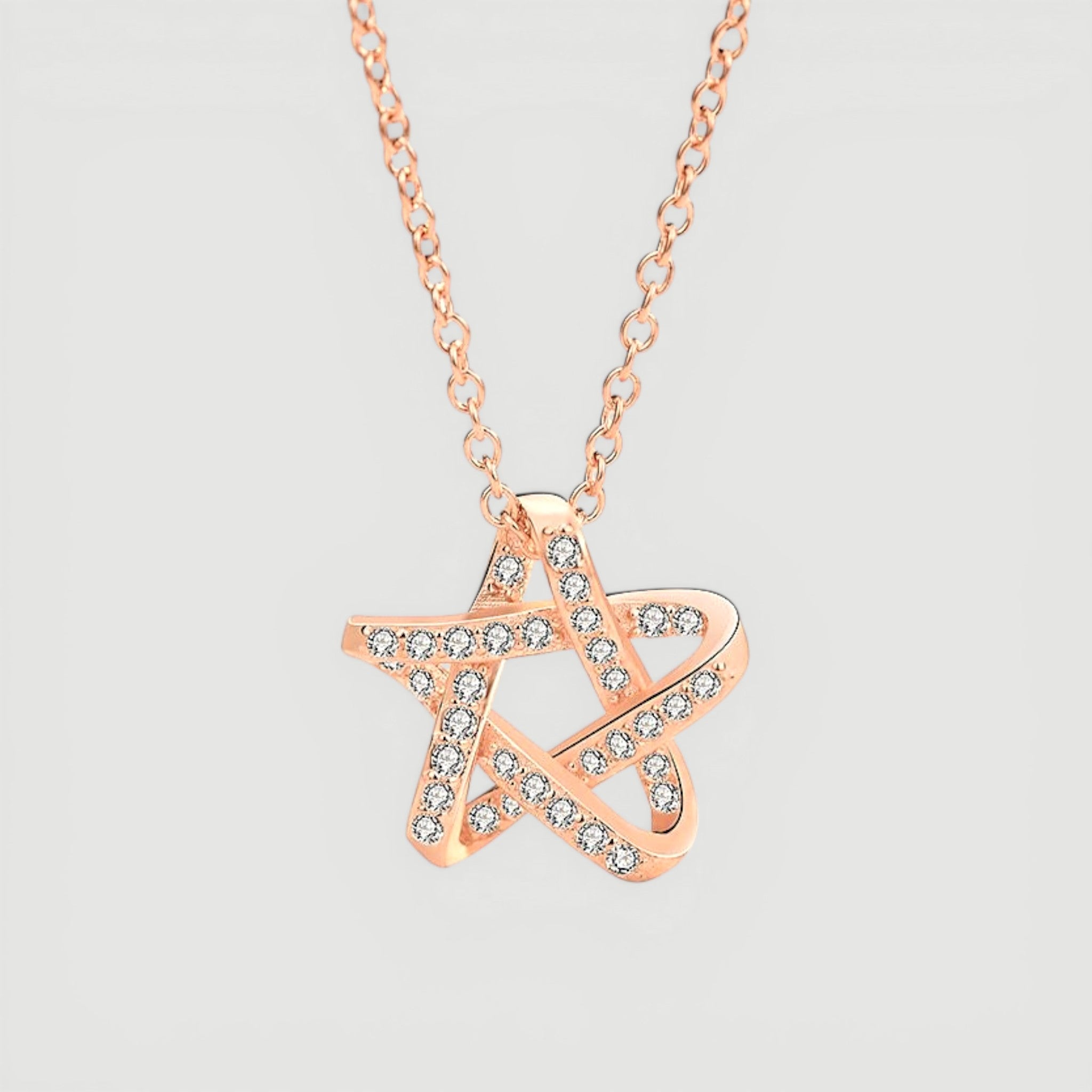 Amara Jewels rose gold plated 925 sterling silver necklace with a crystal-embellished star pendant.