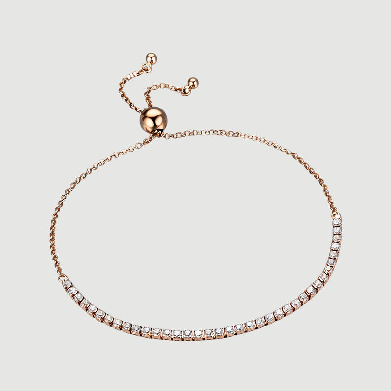 Amara Jewels rose gold adjustable tennis bracelet with white CZ stones and a slider clasp.