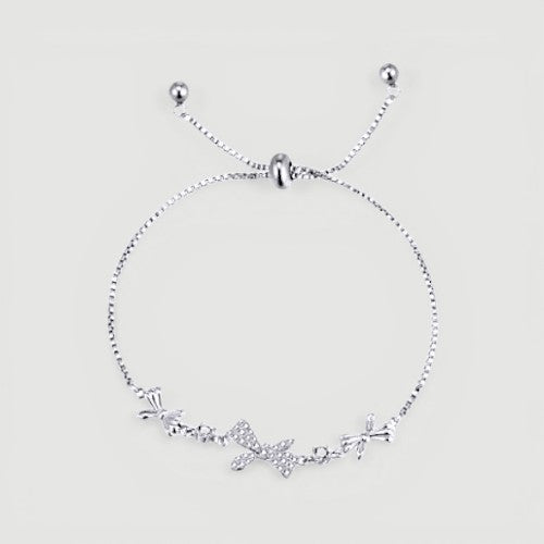 Amara Jewels 925 sterling silver adjustable bracelet with butterfly and floral charms, adorned with sparkling cubic zirconia.