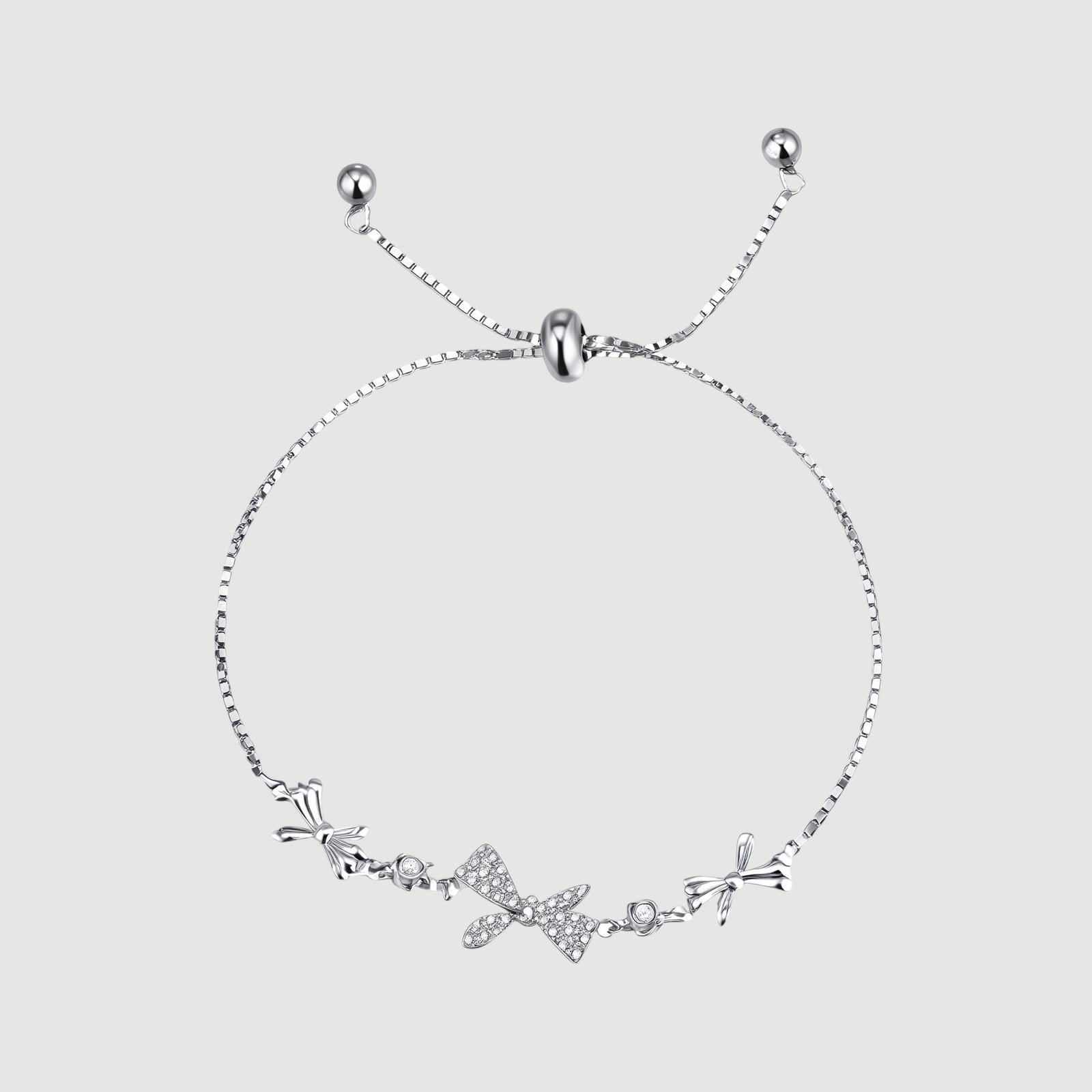 Amara Jewels 925 sterling silver adjustable bracelet with butterfly and floral charms, adorned with sparkling cubic zirconia.