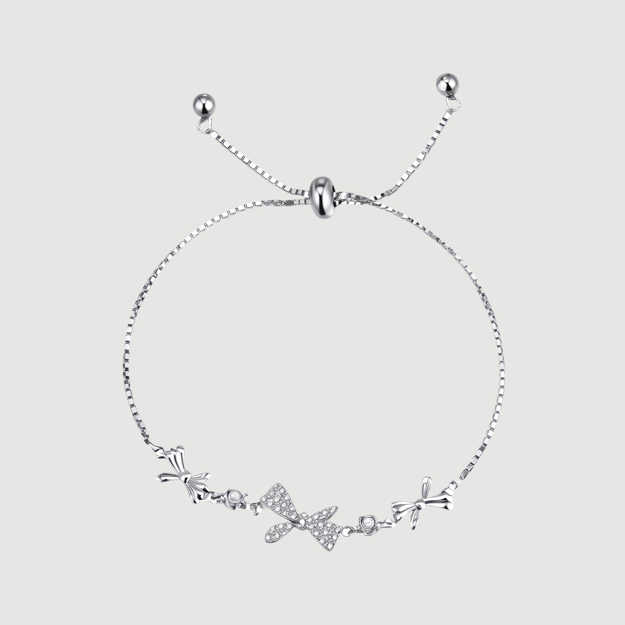 Amara Jewels 925 sterling silver adjustable bracelet with butterfly and floral charms, adorned with sparkling cubic zirconia.