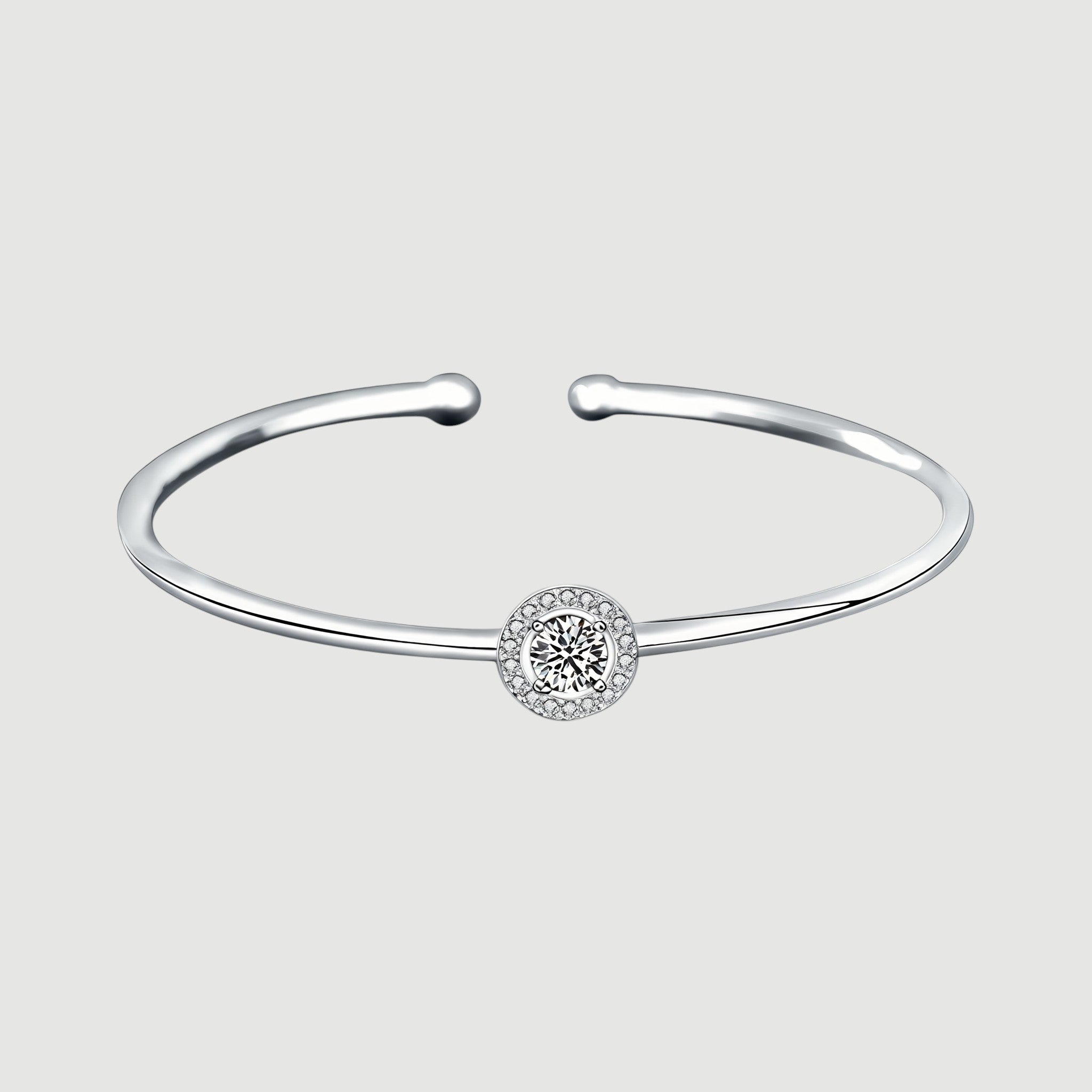 Amara Jewels 925 sterling silver bangle with a sparkling crystal centerpiece, perfect for adding elegance to any outfit.