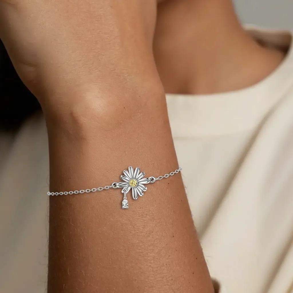 Amara Jewels 925 sterling silver daisy bracelet with yellow and white zircon stones, delicate chain and heart clasp.