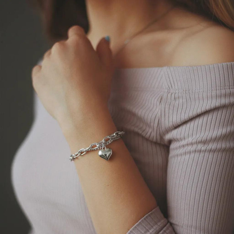 Amara Jewels 925 sterling silver dual-chain bracelet with adjustable length and a polished heart charm.