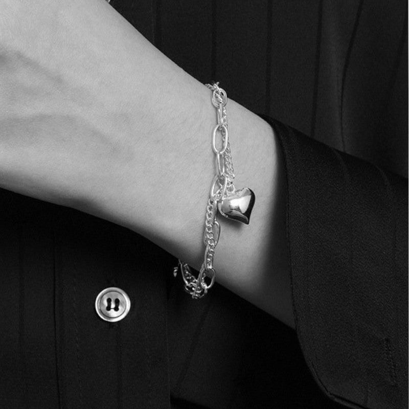 Amara Jewels 925 sterling silver dual-chain bracelet with adjustable length and a polished heart charm.