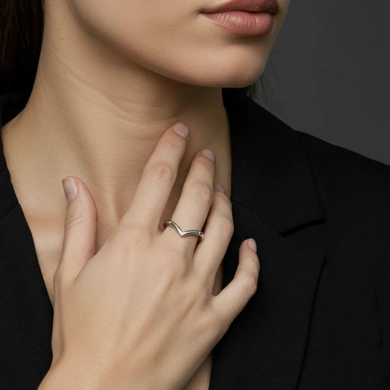Amara Jewels minimalist sterling silver open heart ring with crystal accents.