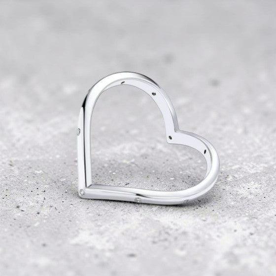 Amara Jewels minimalist sterling silver open heart ring with crystal accents.