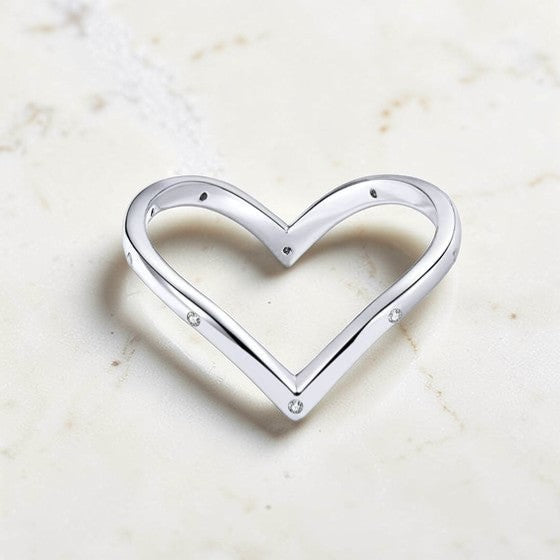 Amara Jewels minimalist sterling silver open heart ring with crystal accents.