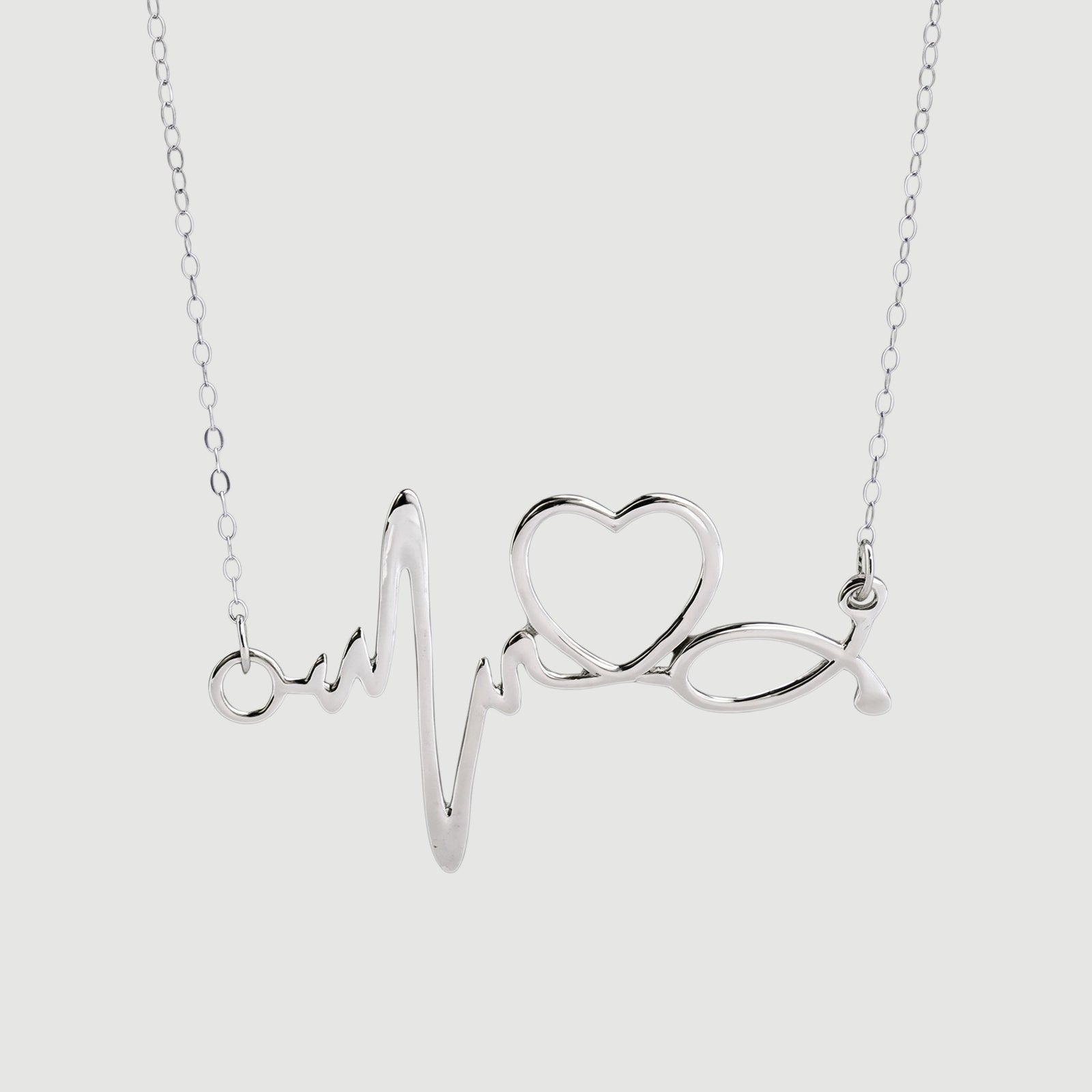 Amara Jewels silver heartbeat necklace with a heart symbol, made of sterling silver.