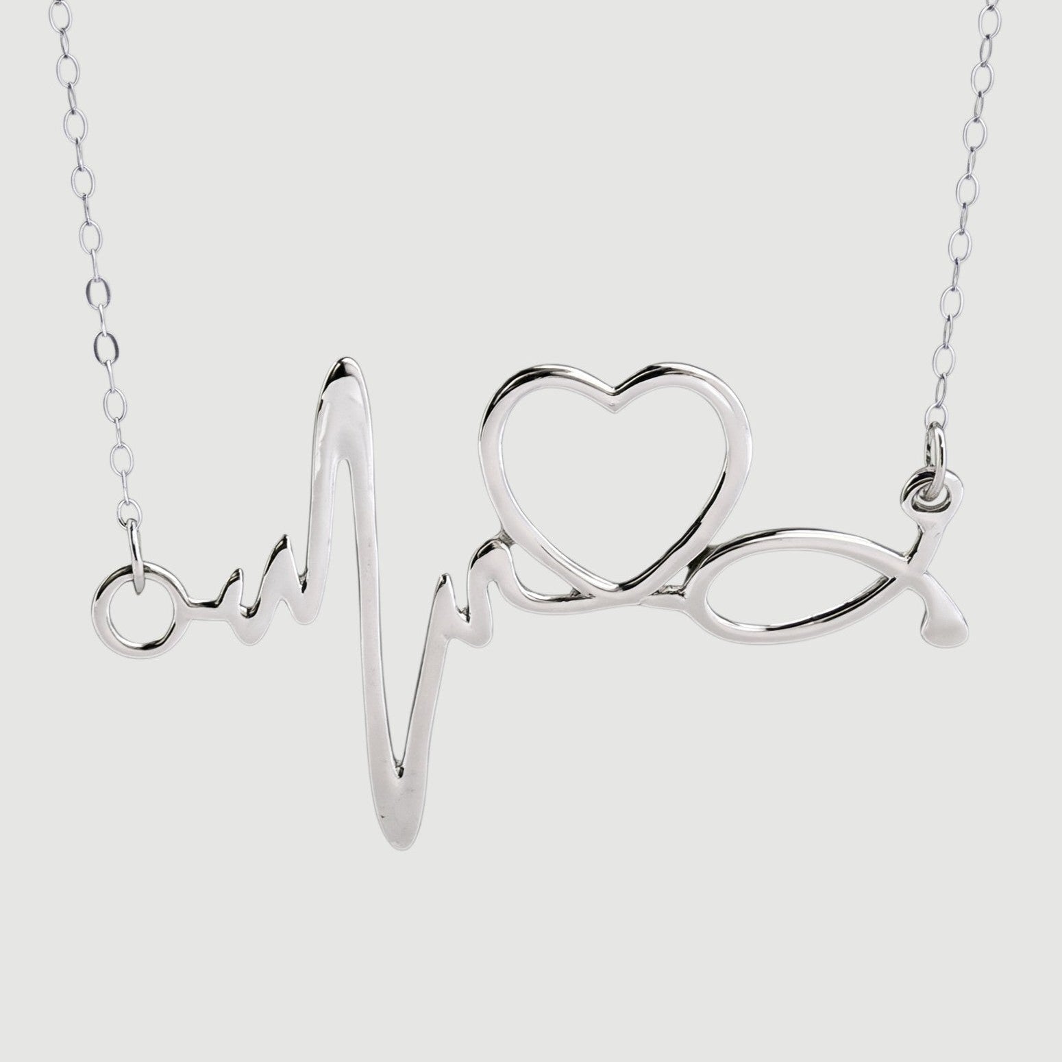 Amara Jewels silver heartbeat necklace with a heart symbol, made of sterling silver.