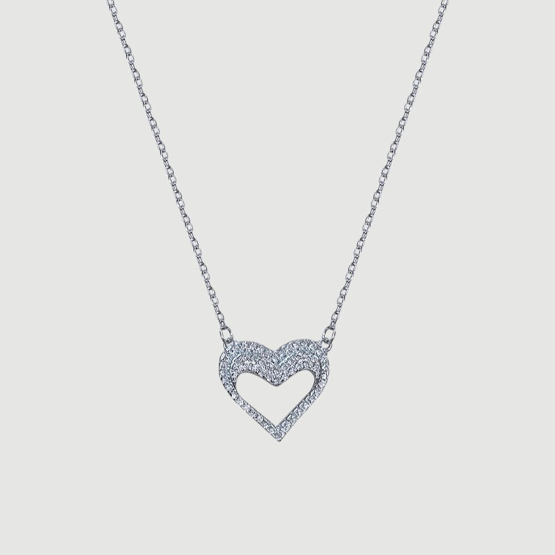 Amara Jewels silver hollow heart necklace with crystal embellishments, delicate chain.