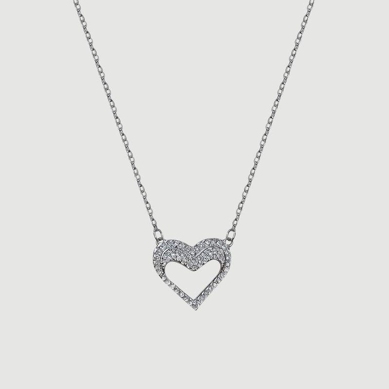 Amara Jewels silver hollow heart necklace with crystal embellishments, delicate chain.