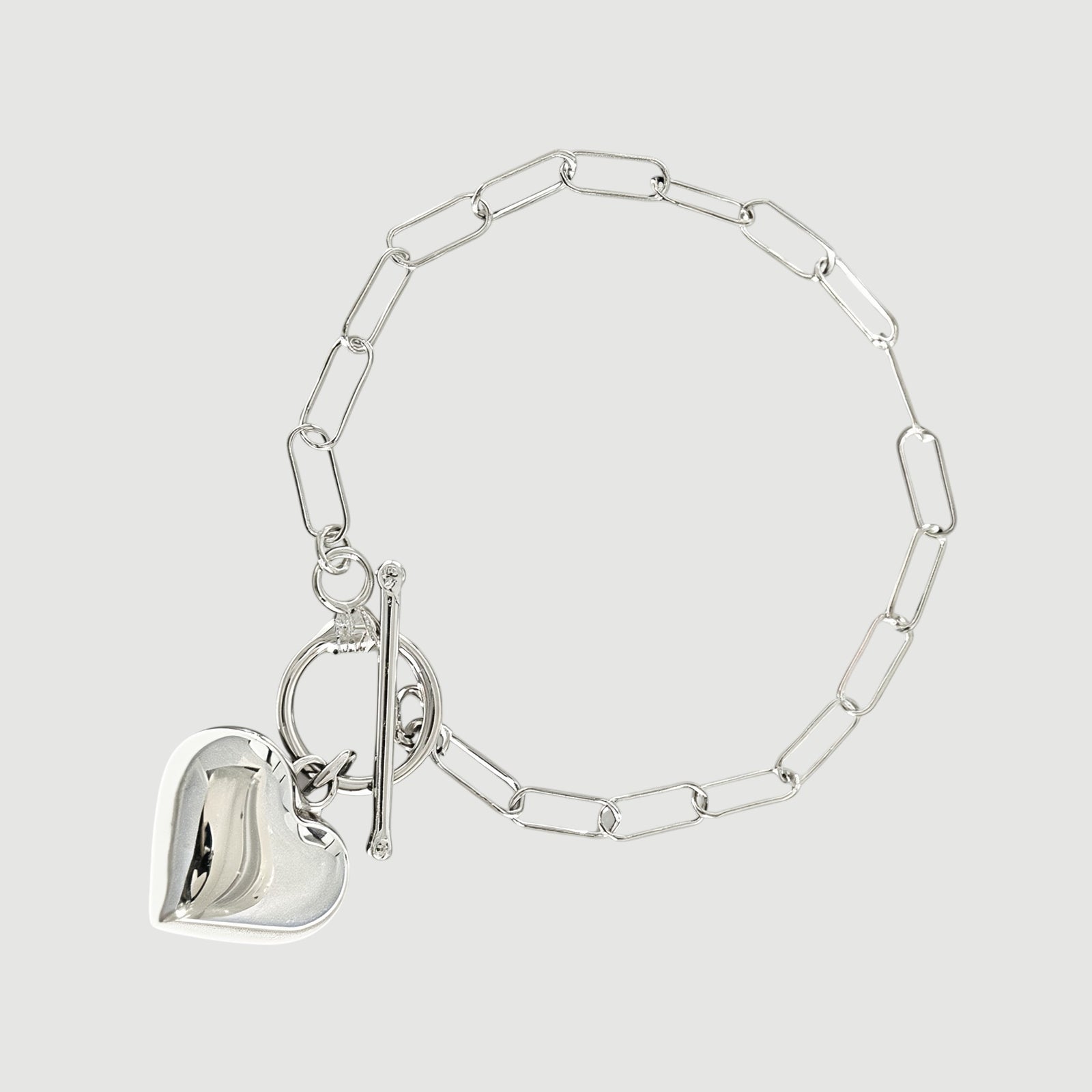Amara Jewels sterling silver paperclip chain bracelet with toggle clasp and polished heart charm.