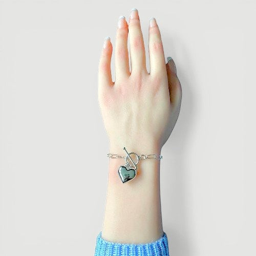 Amara Jewels sterling silver paperclip chain bracelet with toggle clasp and polished heart charm.