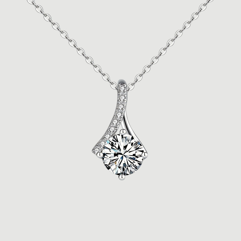 Amara Jewels sterling silver teardrop pendant necklace with round-cut crystal and pave detail.
